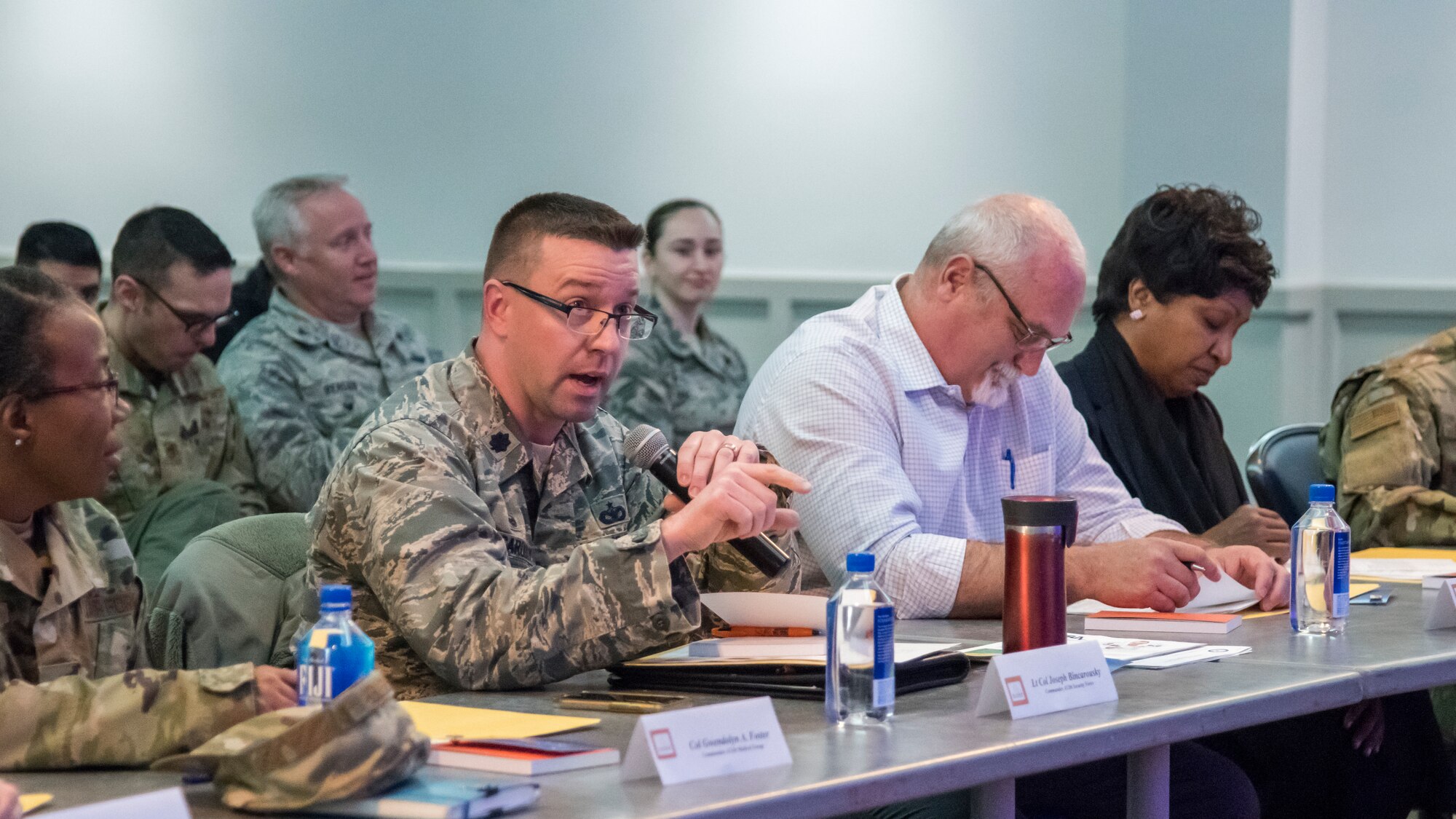 Lt. Col. Joseph Bincarousky, 412th Security Forces Squadron Commander, asks an idea-presenter a questions during a Q&A session portion of the Spark Tank Innovation Showcase event at Edwards Air Force Base, California, Jan. 29. (Air Force photo by Giancarlo Casem)