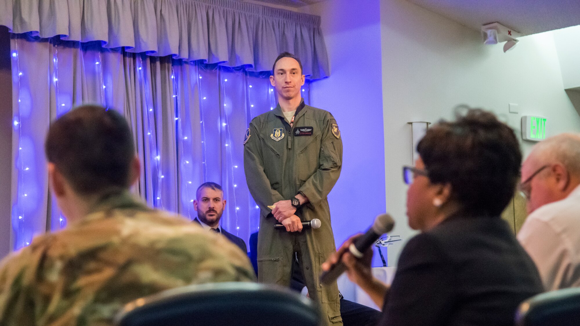 Lt. Col. Raven LeClair, 370th Flight Test Squadron and F-35 JSF, fields questions from a panel of six judges during the Spark Tank Innovation Showcase event at Edwards Air Force Base, California, Jan. 29. (Air Force photo by Giancarlo Casem)