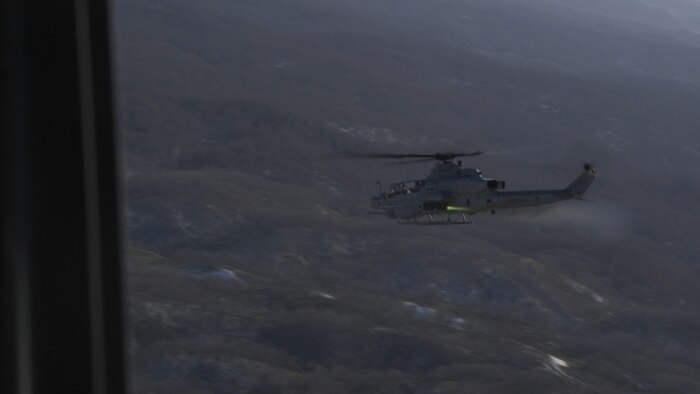 An AH-1Z Viper attack helicopter with Marine Light Attack Helicopter Squadron 369 fires during an aerial live fire shoot at Yausubetsu Training Area, Hokkaido, Japan, Jan. 28, 2020. Northern Viper is a regularly scheduled training exercise that is designed to enhance the interoperability of the U.S. and Japan Alliance by allowing Marine Air-Ground Task Forces from III MEF to maintain their lethality and proficiency in MAGTF Combined Arms Operations in cold weather environments. (U.S. Marine Corps photo by Lance Cpl. Dylan Hess)
