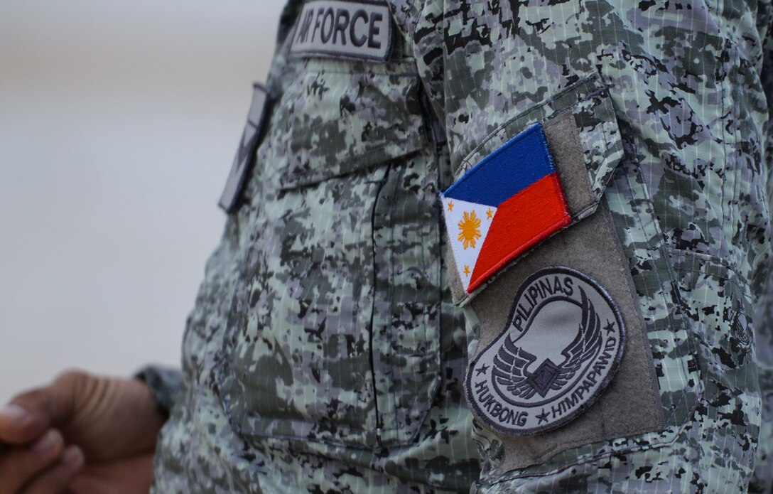 A flag patch and Philippine Air Force patch adorn the uniform of a member from the Philippine AF Jan. 29, 2020 at Andersen Air Force Base, Guam.