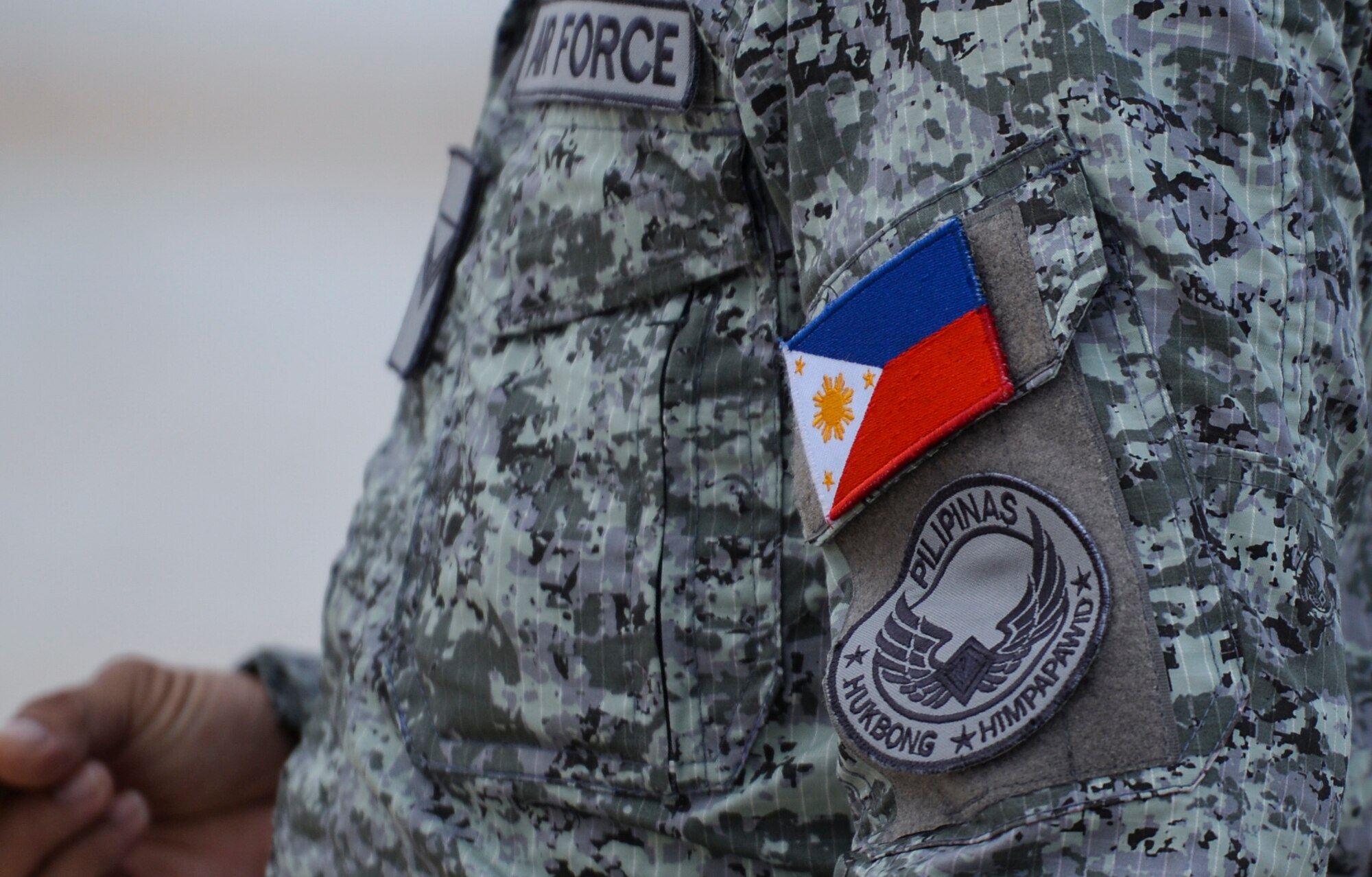 A flag patch and Philippine Air Force patch adorn the uniform of a member from the Philippine AF Jan. 29, 2020 at Andersen Air Force Base, Guam.