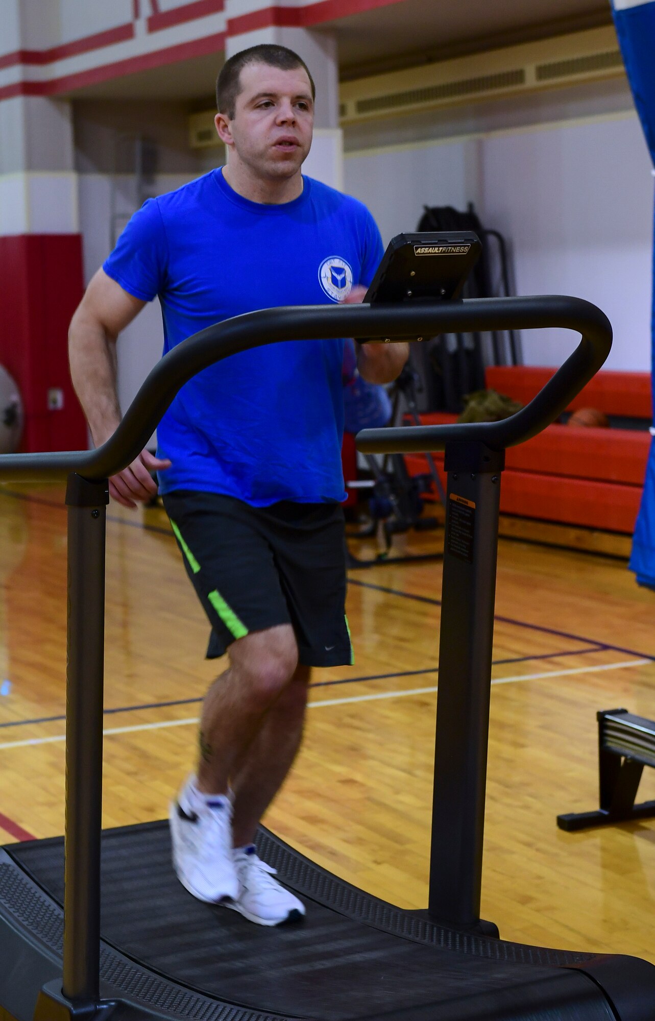 Jeff Stearns, exercise physiologist with the 911th Force Support Squadron, demonstrates how to use the air assault treadmill at the Pittsburgh International Airport Air Reserve Station, Pennsylvania, Jan. 29, 2020.