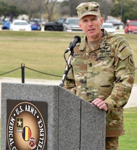 Command Sgt. Maj. Clark J. Charpentier, incoming U.S. Army Medical Center of Excellence Command Sergeant Major, addresses the audience at the MacArthur Parade Field at Joint Base San Antonio-Fort Sam Houston Jan. 31.