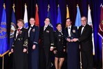 U.S. Central Command’s (USCENTCOM) clinical operations team poses for a group photo during an awards ceremony at the annual meeting of AMSUS, the Society of Federal Health Professionals, Dec. 5 2019. From left to right; U.S. Army Col. Tamara Funari, USCENTCOM’s Chief of Clinical Operations; U.S. Air Force Maj. Steffanie Solberg, U.S. Air Force Central Command’s Chief of Clinical Operations; U.S. Navy Lt. Ashley Hanhurst, Navy Nurse Corps, Walter Reed National Military Medical Center; U.S. Army Cpt. Amanda Roth, microbiologist at US Army Medical Research Directorate – Africa; U.S. Air Force Maj Alice Barsoumian, infectious disease physician at San Antonio Military Medical Center; Thomas McCaffery, Assistant Secretary of Defense for Health Affairs. (Courtesy photo provided by Eddie Arrossi/ AMSUS)
