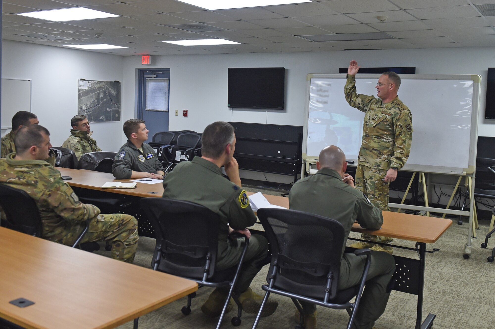 Airmen receive a briefing