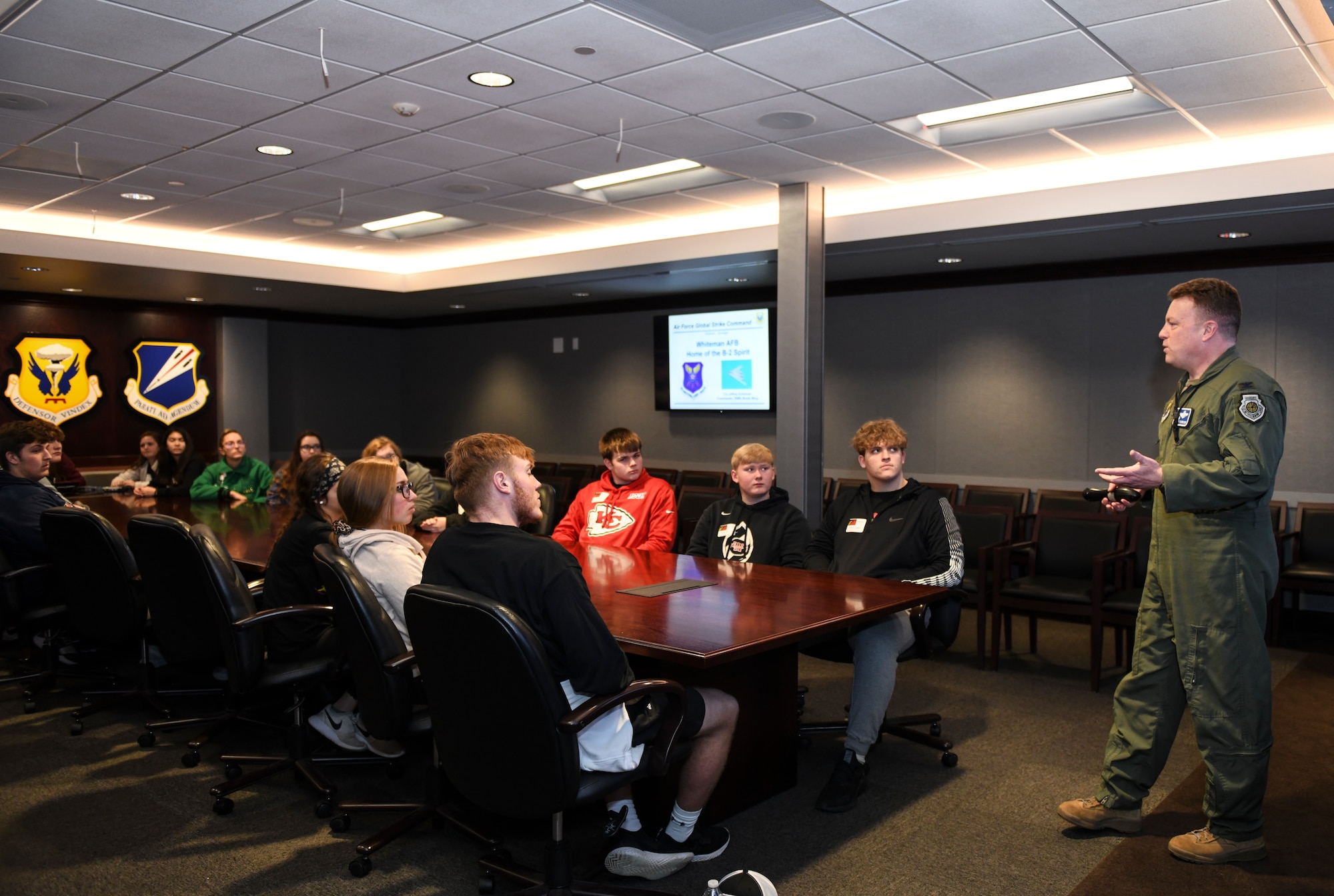 U.S. Air Force Col. Jeffrey T. Schreiner, the 509th Bomb Wing commander, speaks with the Warrensburg High School 2020 Community Leadership and Involvement Means a Better Community High (CLIMB High) Jan. 29, 2020, at Whiteman Air Force Base, Mo. CLIMB High is a youth leadership program in Johnson County, Mo., for students interested in developing leadership skills and learning more about their communities. (U.S. Air Force photo by Staff Sgt. Sadie Colbert)