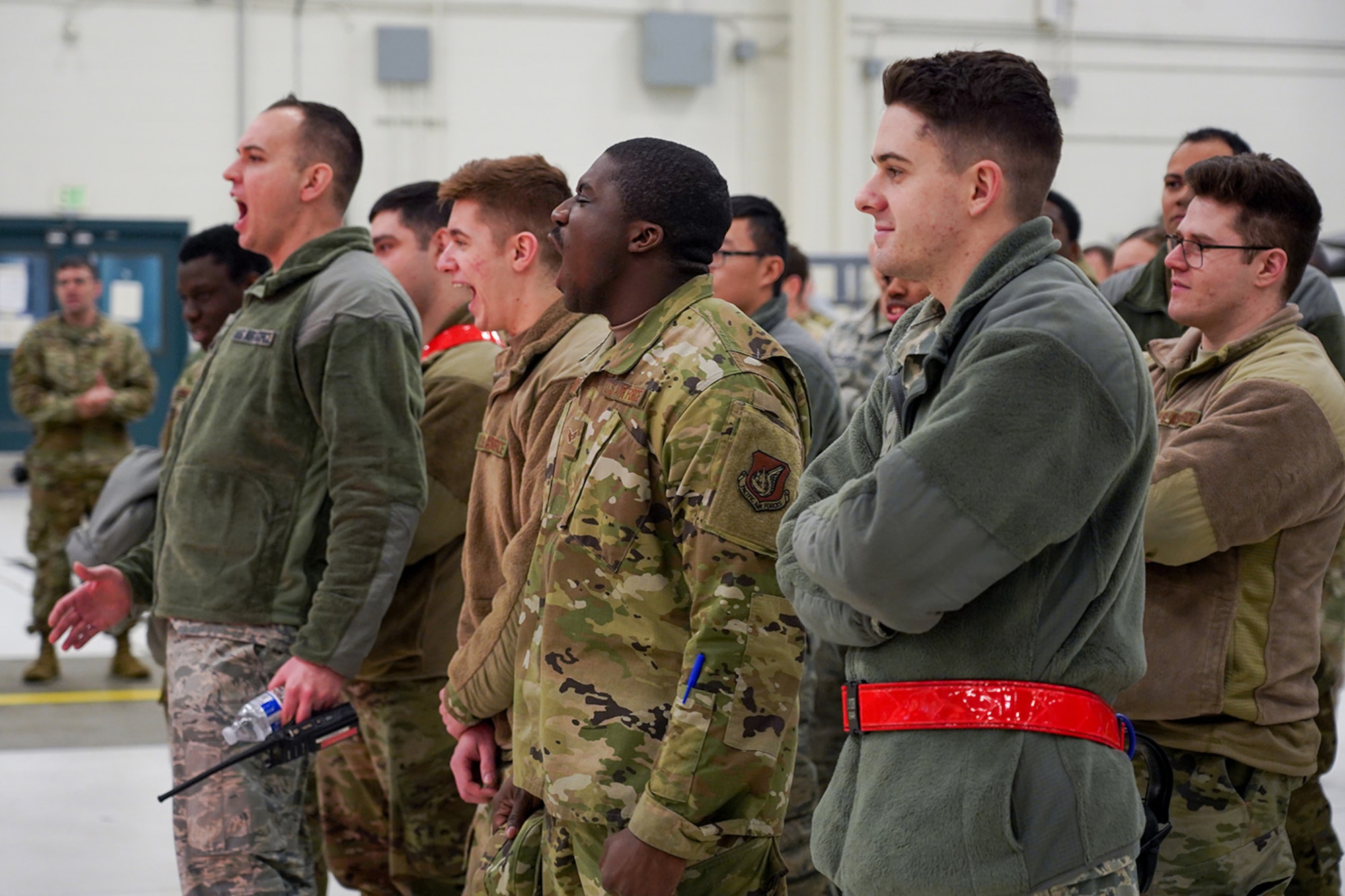 Airmen assigned to the 90th and 525th Aircraft Maintenance Units compete during a timed F-22 Raptor load crew competition on Joint Base Elmendorf-Richardson, Alaska, Jan. 31, 2020.