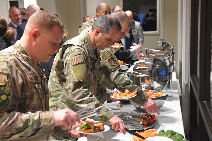 Community members and business leaders enjoy a meal at the  Team Hill Honorary Commanders induction ceremony at Hill Air Force Base Jan. 31.