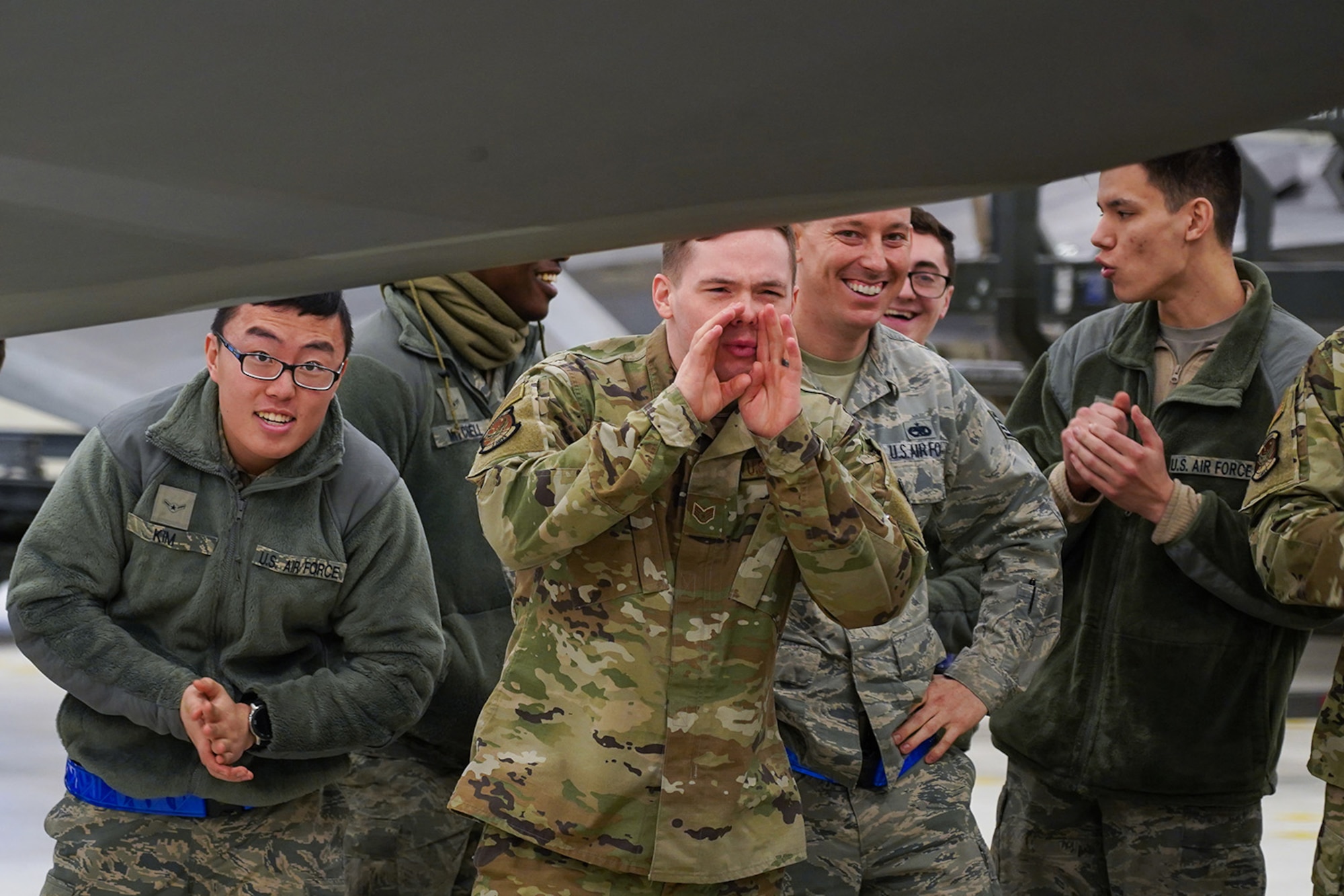 Airmen assigned to the 90th and 525th Aircraft Maintenance Units compete during a timed F-22 Raptor load crew competition on Joint Base Elmendorf-Richardson, Alaska, Jan. 31, 2020.