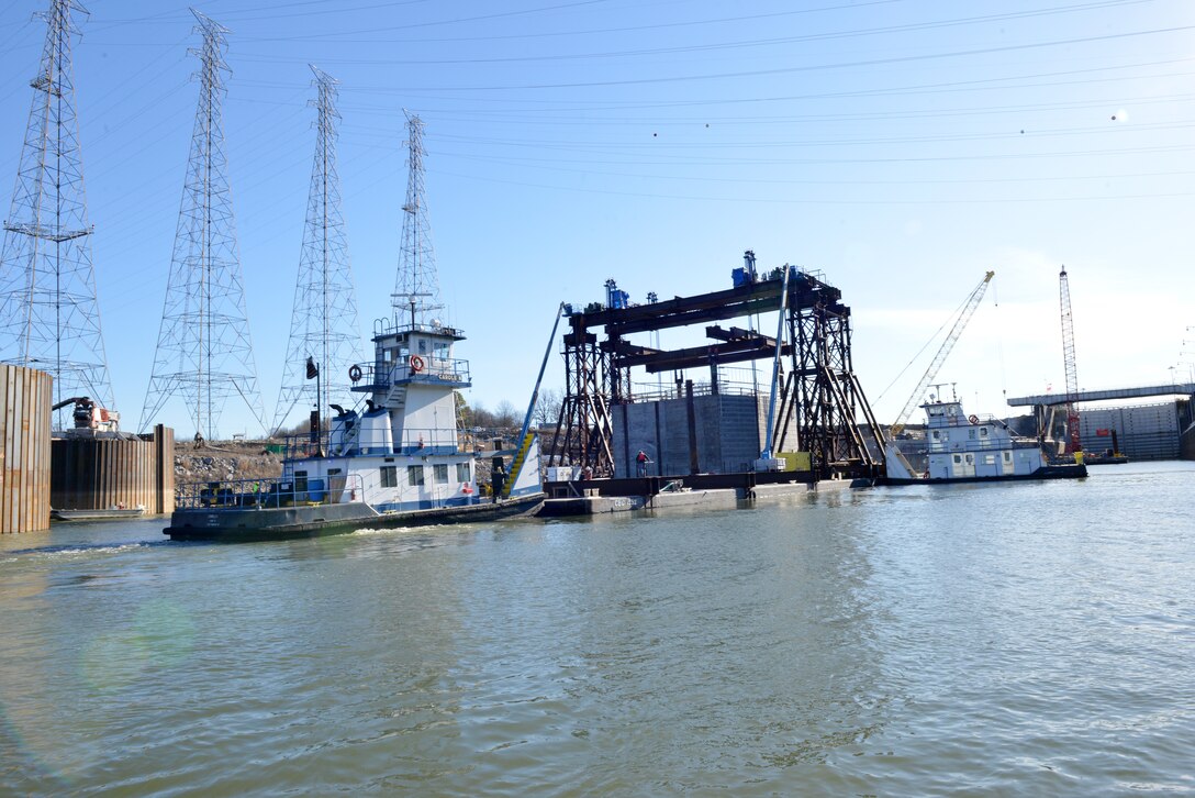 The U.S. Army Corps of Engineers Nashville District and its contractor partner Johnson Brothers put a 1.7 million pound concrete shell into position Feb. 2, 2020 on the riverbed on downstream end of Kentucky Lock where it will be part of a coffer dam and eventually a permanent part of the new lock wall for the Kentucky Lock Addition Project. It is the last of 10 shells. The lock is located at Kentucky Dam, which is a Tennessee Valley Authority project at Tennessee River mile 22.4. (USACE photo by Mark Rankin)