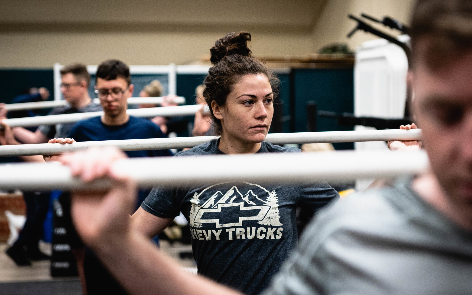 U.S. Air Force Capt. Mercedes Derby, 9th Special Operations Squadron MC-130J Commando II pilot, stretches before participating in a human performance baseline test on Cannon Air Force Base, N.M., Jan. 30, 2020. The human performance baseline test is an Air Force Special Operations Command pilot test to determine the effectiveness of the new human performance program. (U.S. Air Force photo by Senior Airman Candin Muniz)