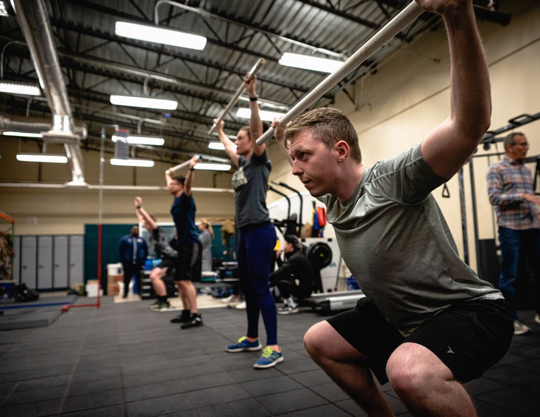U.S. Air Force Senior Airman Cole Strader, 551st Special Operations Squadron direct support operator, stretches before participating in a human performance baseline test on Cannon Air Force Base, N.M., Jan. 30, 2020. The human performance baseline test is an Air Force Special Operations Command pilot test to determine the effectiveness of the new human performance program. (U.S. Air Force photo by Senior Airman Candin Muniz)