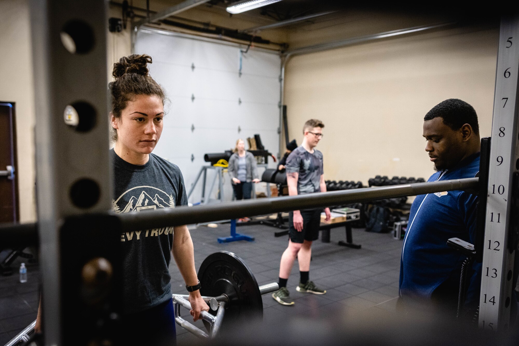 U.S. Air Force Captain Mercedes Derby, 9th Special Operations Squadron MC-130J Commando II pilot, prepares to take a squat test at a human performance baseline test on Cannon Air Force Base, N.M., Jan. 30, 2020. The human performance baseline test is an Air Force Special Operations Command pilot test to determine the effectiveness of the new human performance program. (U.S. Air Force photo by Senior Airman Candin Muniz)
