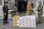 Commander, Naval Forces Korea Sailors and ROK MCPON Deliver Care Packages to Korean Sailors