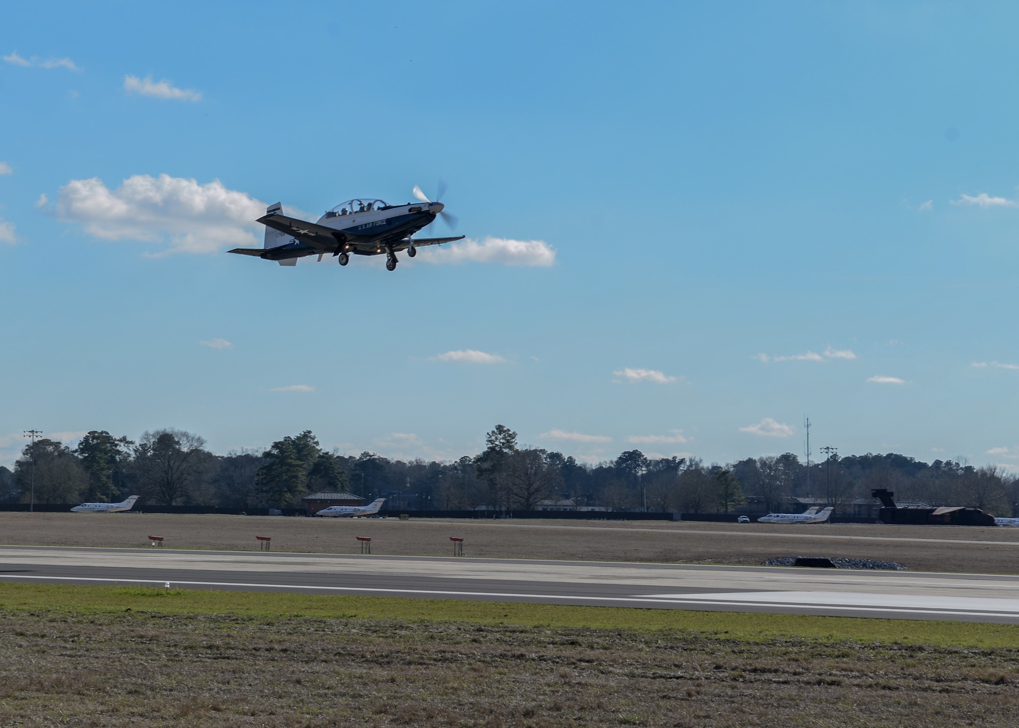 A T-6 Texan II takes off of the flightline with a student pilot and instructor pilot, Jan. 27, 2020, at Columbus Air Force Base, Mississippi. The T-6 can reach a maximum speed of 320 mph. (U.S. Air Force photo by Airman Davis Donaldson)