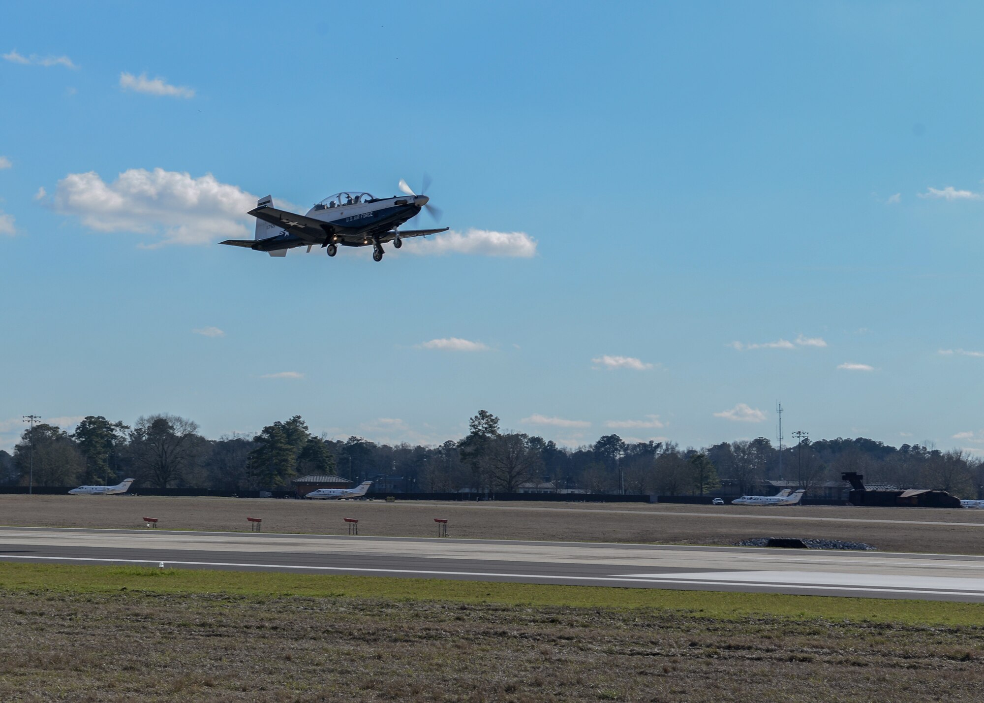 A T-6 Texan II takes off of the flightline with a student pilot and instructor pilot, Jan. 27, 2020, at Columbus Air Force Base, Mississippi. The T-6 can reach a maximum speed of 320 mph. (U.S. Air Force photo by Airman Davis Donaldson)