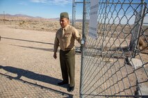 Sergeant Jeffrey Xochicale, ammo supply technician and barracks manager, Marine Corps Logistics Base Barstow, unlocked access to the ammo bunker aboard base in preparation for an inspection of the facility by the fire department.