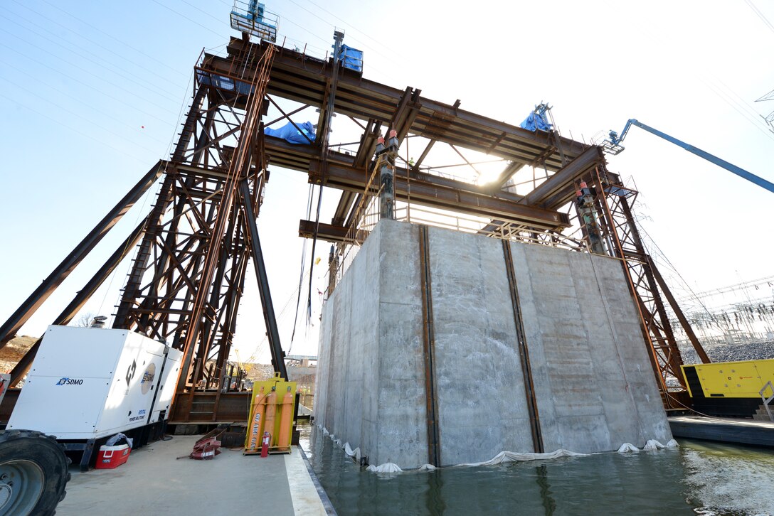 The U.S. Army Corps of Engineers Nashville District and its contractor partner Johnson Brothers put a 1.7 million pound concrete shell into position Feb. 2, 2020 on the riverbed on downstream end of Kentucky Lock where it will be part of a coffer dam and eventually a permanent part of the new lock wall for the Kentucky Lock Addition Project. It is the last of 10 shells. The lock is located at Kentucky Dam, which is a Tennessee Valley Authority project at Tennessee River mile 22.4. (USACE Photo by Mark Rankin)