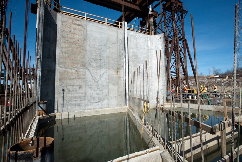 The U.S. Army Corps of Engineers Nashville District and contractor Johnson Brothers place the final concrete shell on the riverbed of the Tennessee River Feb. 2, 2020 below Kentucky Lock in Grand Rivers, Ky. It is the 10th concrete shell that is part of the permanent downstream lock wall and will double as part of a coffer dam for the Kentucky Lock Addition Project. (USACE photo by Lee Roberts)