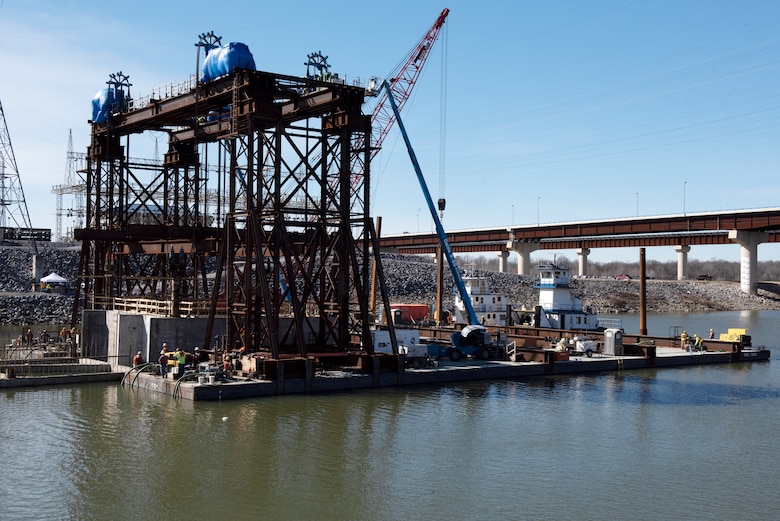 The U.S. Army Corps of Engineers Nashville District and contractor Johnson Brothers place the final concrete shell on the riverbed of the Tennessee River Feb. 2, 2020 below Kentucky Lock in Grand Rivers, Ky. It is the 10th concrete shell that is part of the permanent downstream lock wall and will double as part of a coffer dam for the Kentucky Lock Addition Project. (USACE photo by Lee Roberts)