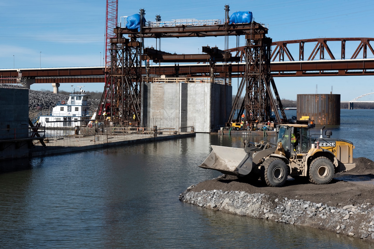 The U.S. Army Corps of Engineers Nashville District and contractor Johnson Brothers place the final concrete shell on the riverbed of the Tennessee River Feb. 2, 2020 below Kentucky Lock in Grand Rivers, Ky. It is the 10th concrete shell that is part of the permanent downstream lock wall and will double as part of a coffer dam for the Kentucky Lock Addition Project. (USACE photo by Lee Roberts)