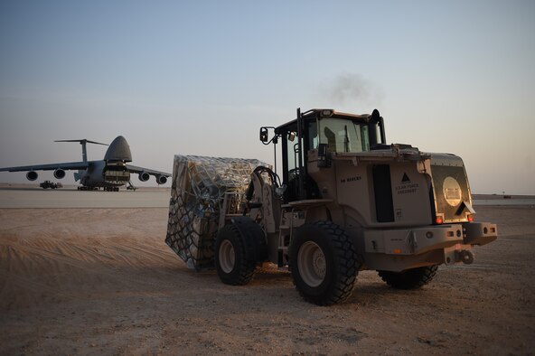An Airman from the 621st Contingency Response Group helps offload cargo from a C-5M Super Galaxy at Prince Sultan Air Base, Kingdom of Saudi Arabia, June 25, 2019. The 621st CRG deployed for an air base opening mission in response to the White House authorization of approximately 1,000 additional troops in U.S. Central Command's area of responsibility for defensive purposes to address air, naval, and ground-based threats in the Middle East. (U.S. Air Force photo by Staff Sgt. Sarah Brice)