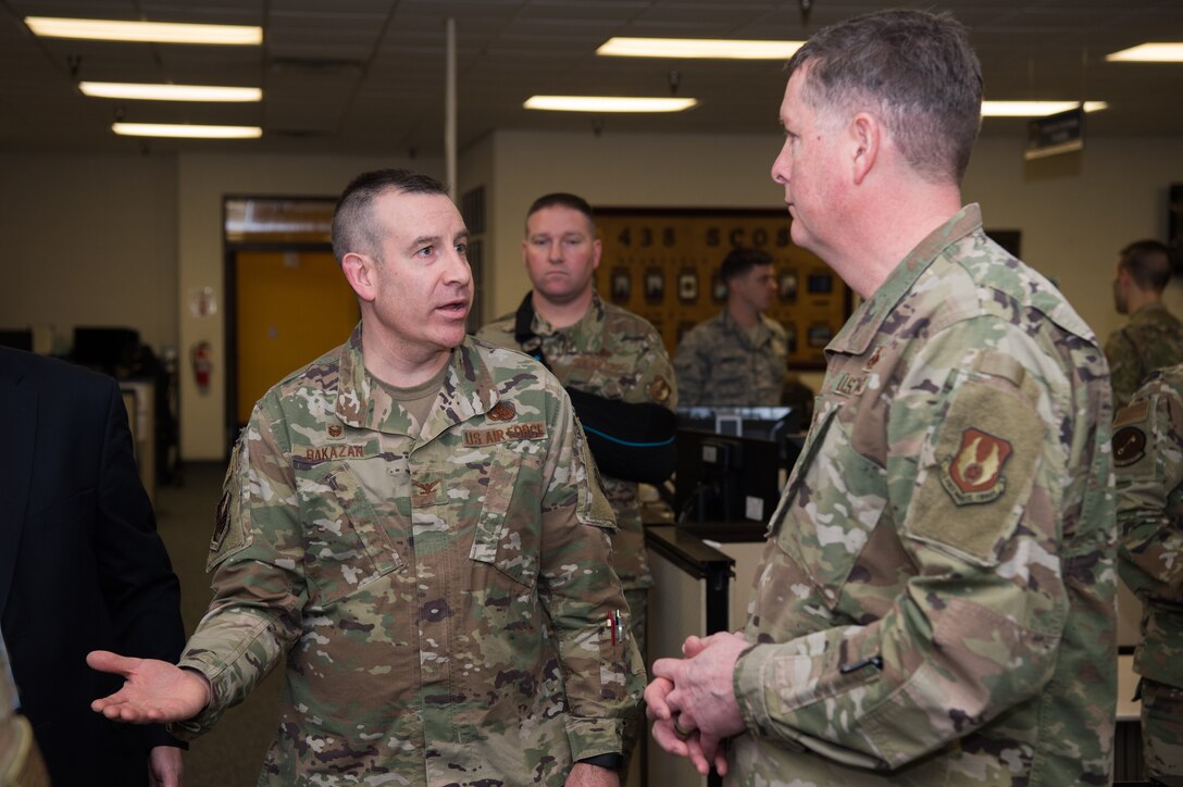 U.S. Air Force Lt. Gen. Gene Kirkland, Air Force Sustainment Center commander, speaks with Col. Ryan Bakazan, 735th Supply Chain Operation Group commander, during his visit to Joint Base Langley-Eustis, Virginia, Jan. 28, 2020. Taking a more proactive approach to ensuring mission readiness, the Air Force is embarking in predictive analytics to help preempt supply chain needs. (U.S. Air Force photo by Senior Airman Tristan Biese)