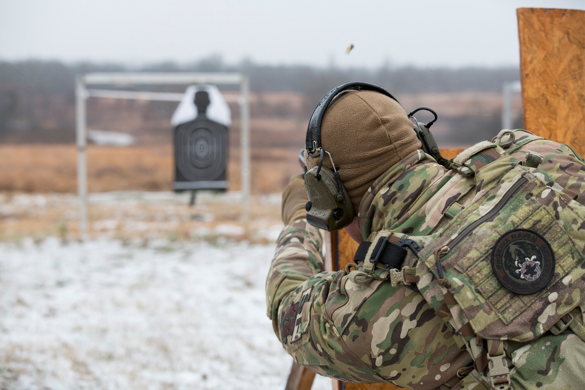 Master Sgt. Gregory Wardle, 153rd Security Forces Squadron, conducts pistol drills Jan. 22, 2020, at Ft. Chaffee, Arkansas. Wardle is part of the Air National Guard’s Defender Challenge team, composed of Airmen from across the ANG who gathered at Ft. Chaffee to train for the upcoming competition. (U.S. Air National Guard photo by Airman 1st Class Christopher Sherlock)