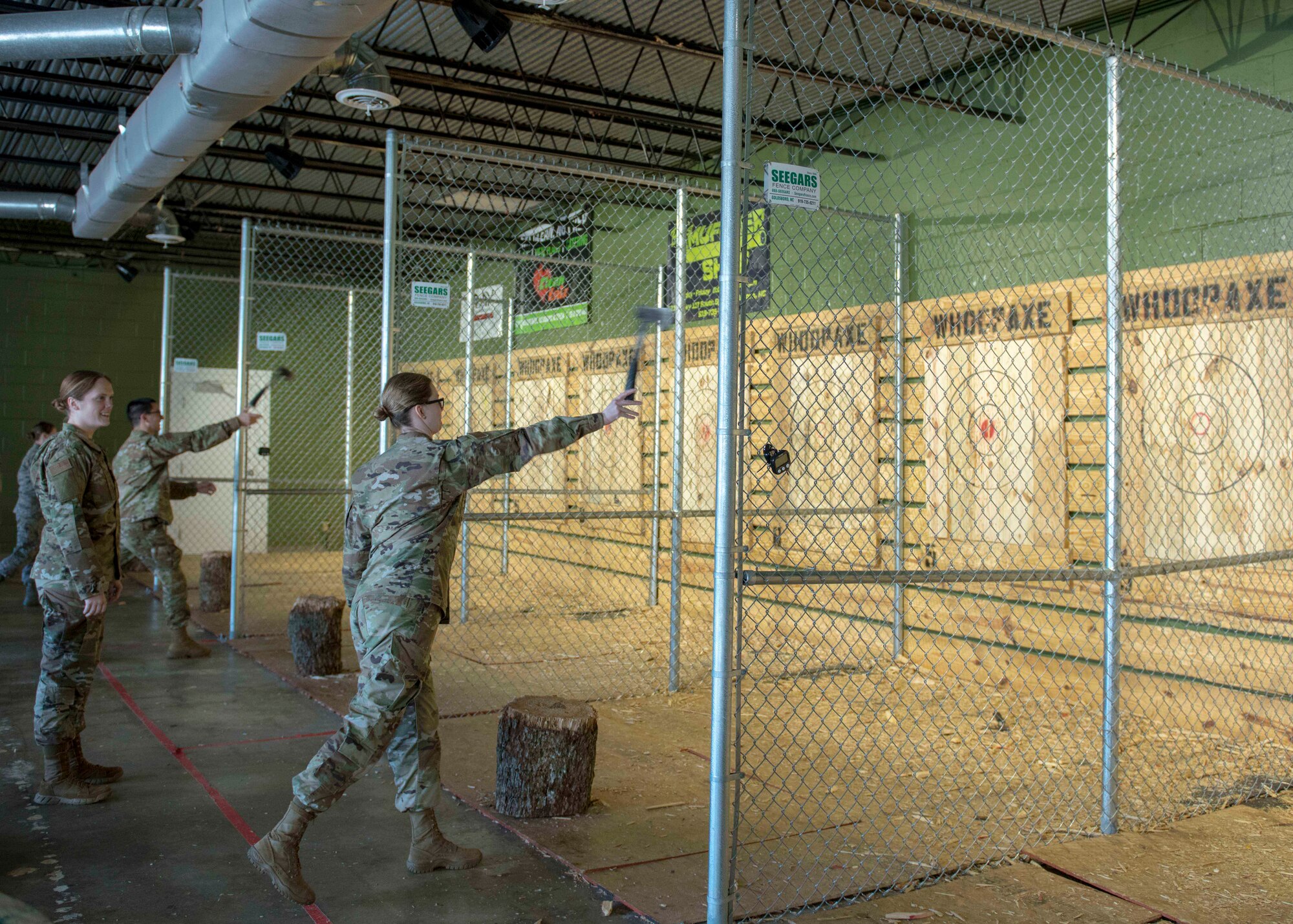 Airmen from the 4th Operational Medical Readiness Squadron throw axes at targets, Jan. 30, 2020, in Goldsboro, N.C.