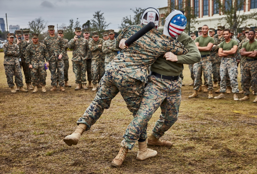 U.S. Marines with Marine Forces Reserve execute baton fighting techniques at Marine Corps Support Facility New Orleans, Jan. 31, 2020. The MFR King of the Ring tournament challenges competitors to three categories of knife fighting, grappling and baton fighting to become the overall King of the Ring champion. (U.S. Marine Corps photo by Lance Cpl. Leslie Alcaraz)