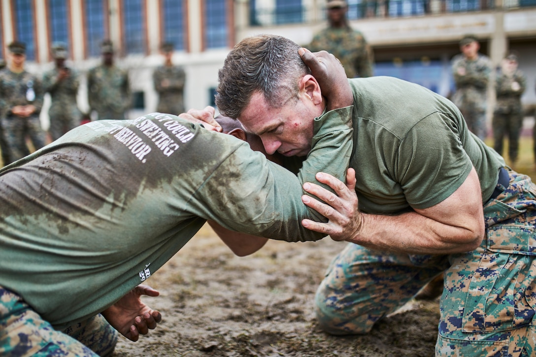 U.S. Marines with Marine Forces Reserve participate in the grappling portion during the King of the Ring tournament at Marine Corps Support Facility New Orleans, Jan. 31, 2020. The tournament challenges competitors to three categories of knife fighting, grappling and baton fighting to become the overall King of the Ring champion. (U.S. Marine Corps photo by Lance Cpl. Leslie Alcaraz)