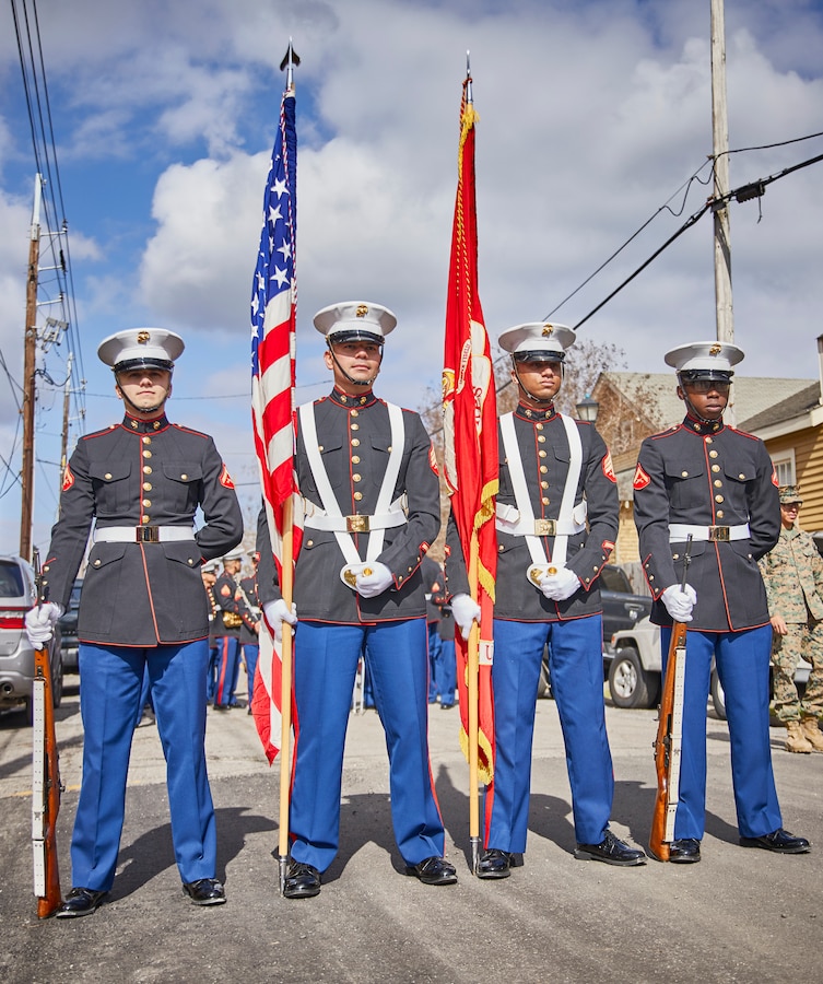 The Marine Forces Reserve color guard prepares to march during the Algiers Festival 2020 in Federal City, New Orleans, Feb. 1, 2020. The band performed to show their support towards the New Orleans community and kicked off the Algiers Festival 2020. (U.S. Marine Corps photo by Lance Cpl. Leslie Alcaraz)