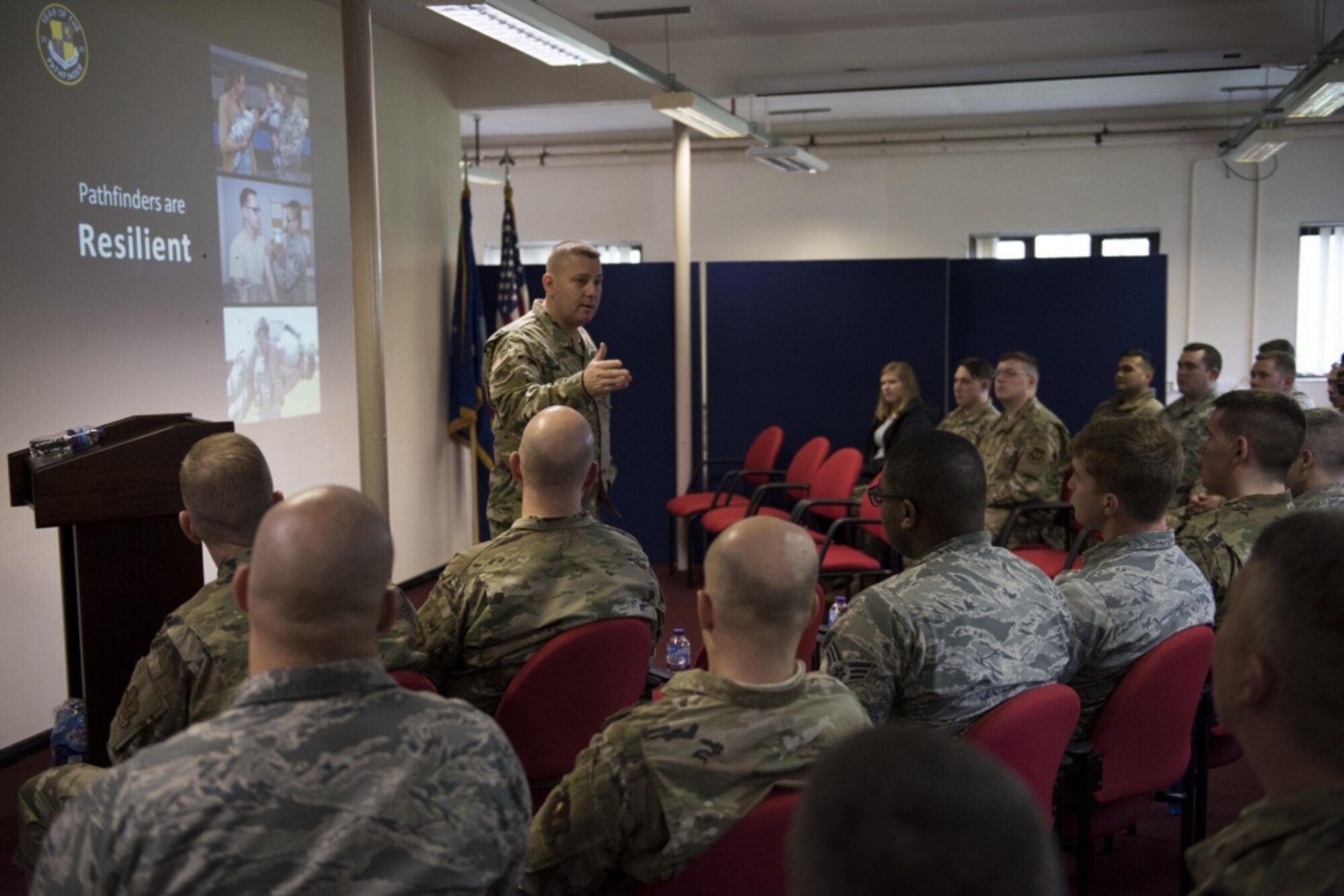 U.S. Air Force Chief Master Sgt. Daniel Keene, 501st Combat Support Wing command chief, speaks with military and civilian personnel about resilience during the 501st CSW All-Call at the RAF Welford, England, Jan. 24, 2020. The wing commander and command chief traveled nearly 3,000 miles across England and Norway to all seven bases within the 501st CSW to connect with Airmen face-to-face and kick off a new initiative. Year of the Pathfinder aims to revolutionize the wing’s identity and raise the bar for readiness, resilience, innovation, professionalism, and connectedness. (U.S. Air Force photo by Airman 1st Class Jennifer Zima)