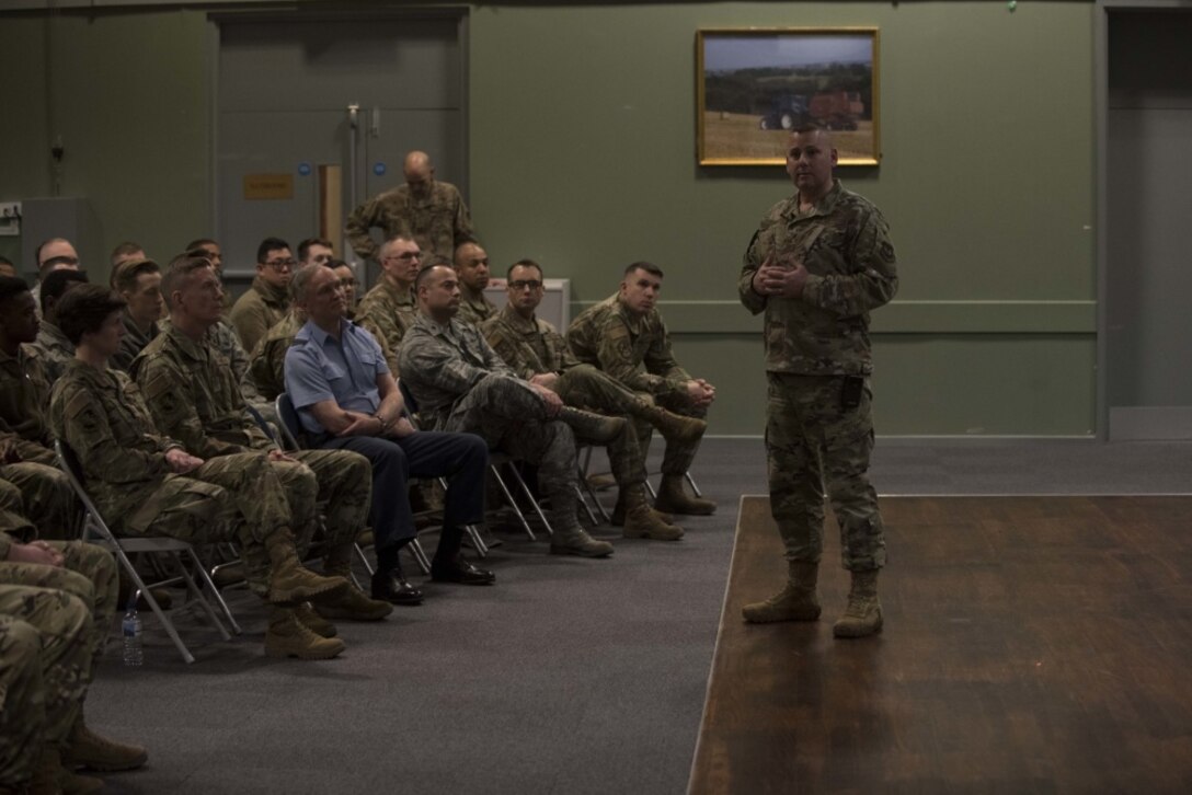 U.S. Air Force Chief Master Sgt. Daniel Keene, 501st Combat Support Wing command chief, speaks with military and civilian personnel about resilience during the 501st CSW All-Call at the RAF Croughton, England, Jan. 24, 2020. The wing commander and command chief traveled nearly 3,000 miles across England and Norway to all seven bases within the 501st CSW to connect with Airmen face-to-face and kick off a new initiative. Year of the Pathfinder aims to revolutionize the wing’s identity and raise the bar for readiness, resilience, innovation, professionalism, and connectedness. (U.S. Air Force photo by Airman 1st Class Jennifer Zima)