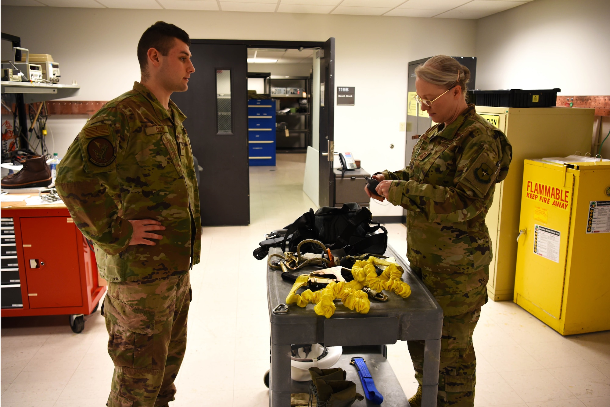 Chief Master Sgt. Kellie Brisse (right), 14th Operations Group superintendent, and Senior Airman Brandon Culp, 14th Operations Support Squadron’s Radar, Airfield and Weather Systems journeyman, check over safety equipment at the RAWS facility Jan. 28, 2020, on Columbus Air Force Base Mississippi. Looking over equipment and checking all safety feature are in working condition is paramount in the everyday work of RAWS Airmen. (U.S. Air Force photo by Airman 1st Class Jake Jacobsen)