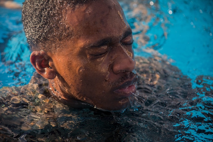 A U.S. Marine treads water during water survival advanced training at the Fairchild Pool on Kadena Air Base, Okinawa, Japan, Jan. 31.