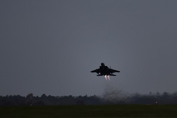 An F-15E Strike Eagle assigned to the 492nd Fighter Squadron takes off at Royal Air Force Lakenheath, England, Jan. 8, 2020. The 492nd conducts routine training daily to ensure RAF Lakenheath brings unique air combat capabilities to the fight when called upon by United States Air Forces in Europe-Air Forces Africa. (U.S. Air Force photo by Airman 1st Class Madeline Herzog)