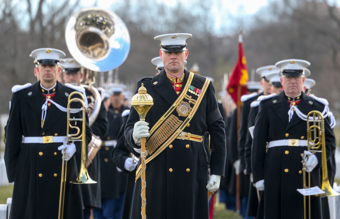 Marines with “The President’s Own,” U.S. Marine Band, march in a funeral procession during a full honors funeral for Brig. Gen. Donald H. Brooks at Arlington National Cemetery, Jan. 29.
