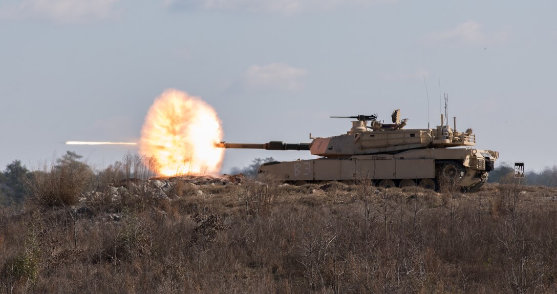 An Army tank fires during training.