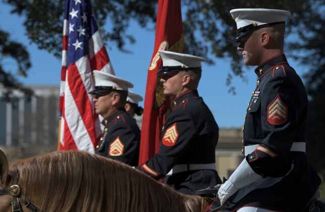 The Marine Corps Mounted Color Guard passes through the streets of San Antonio, during the Western Heritage Parade, Feb. 1.