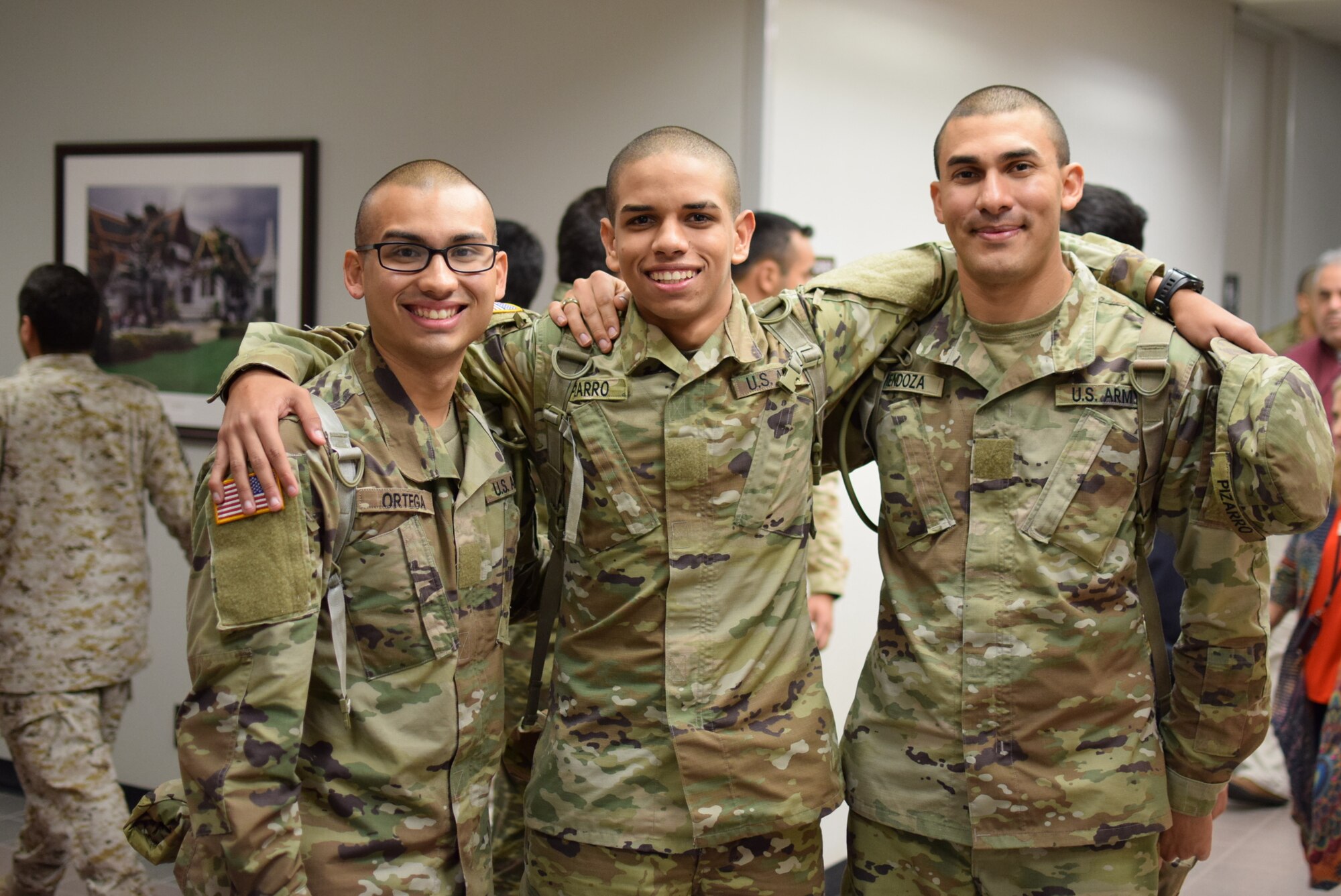 Echo Company trainees pose for a photo in a Defense Language Institute English Language Center hallway between classes. Along with English language training and pre-basic training, trainees have the opportunity to react with the 70 other unique countries on campus at one time.