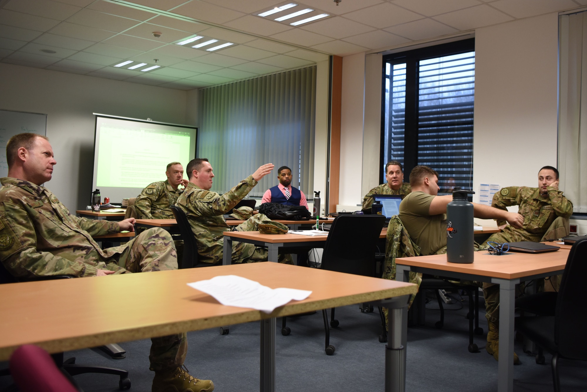 U.S. Air Advisors from the 435th Contingency Response Support Squadron have discussions during a data conference at Ramstein Air Base, Germany, Jan. 23, 2020. The air advisors brought in a consultant from the private sector to get a fresh prospective on data collection and analysis