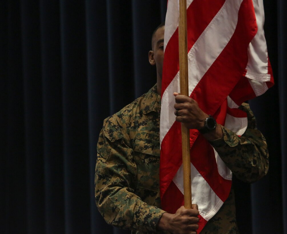 The 38th Color Sergeant of the Marine Corps, Sgt. Francis S. Frazier, carries the National Ensign during a relief and appointment ceremony at Marine Barracks Washington, D.C., Feb. 4, 2020. The Color Sergeant of the Marine Corps serves as the senior sergeant of the Corps, entrusted with carrying the National Ensign in ceremonies throughout the National Capital Region and across the nation. The Color Sergeant leads the official Color Guard Platoon at MBW at is responsible for training and preparing the Marines for future service in the operating forces. (U.S. Marine Corps photo by Sgt. Robert Knapp/Released)