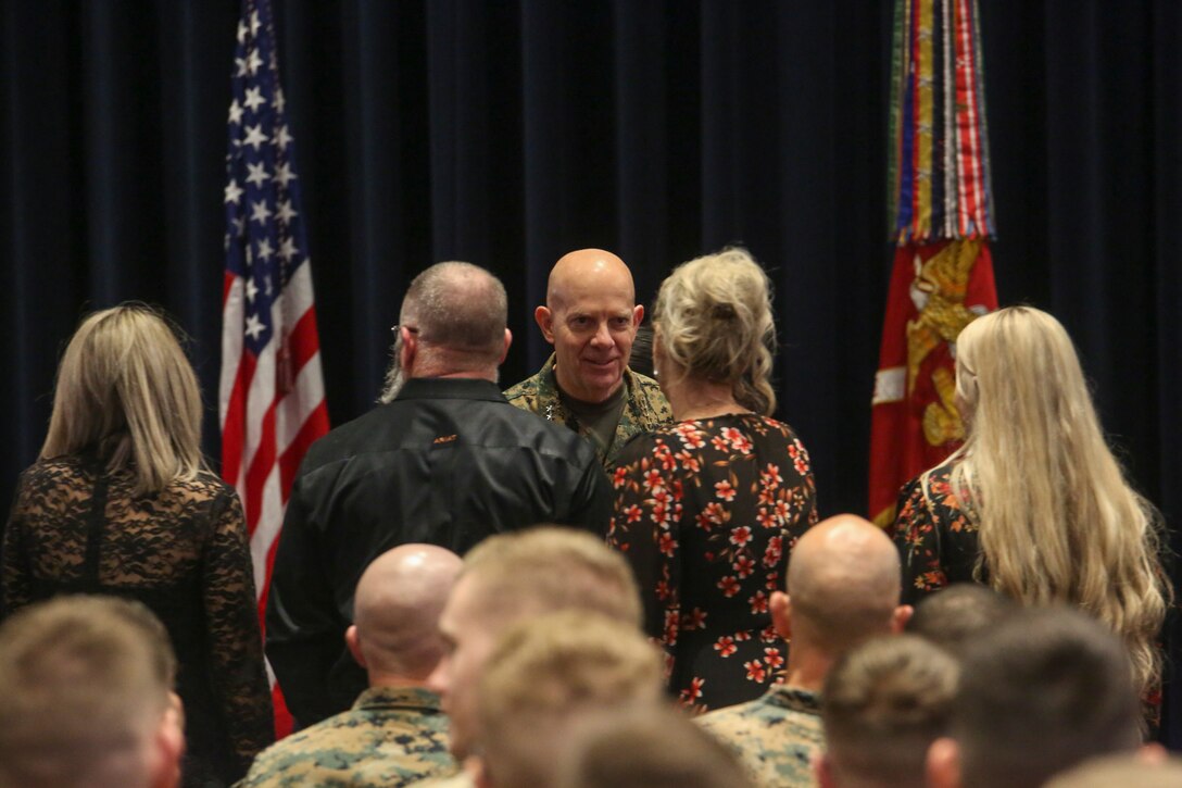 Commandant of the Marine Corps, Gen. David H. Berger, greets family members of the 39th Color Sergeant of the Marine Corps, Sgt. Franklin D. Taft, during a relief and appointment ceremony at Marine Barracks Washington, D.C., Feb. 4, 2020. The Color Sergeant of the Marine Corps serves as the senior sergeant of the Corps, entrusted with carrying the National Ensign in ceremonies throughout the National Capital Region and across the nation. The Color Sergeant leads the official Color Guard Platoon at MBW at is responsible for training and preparing the Marines for future service in the operating forces. (U.S. Marine Corps photo by Sgt. Robert Knapp/Released)