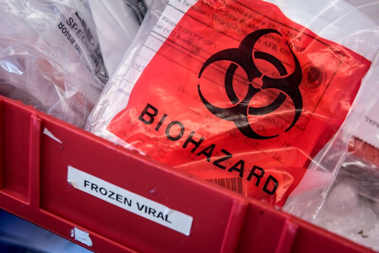 A biohazard logo marks a bag containing one of the 5,000 to 8,000 blood serum, fecal, urine, viral and respiratory samples that arrive six days a week from U.S. Air Force hospitals and clinics worldwide, as well as some other Department of Defense facilities, for analysis at the Epidemiology Laboratory Service, also known as the "Epi Lab" at the 711th Human Performance Wing’s United States Air Force School of Aerospace Medicine and Public Health at Wright Patterson AFB, Ohio.The lab is a Department of Defense reference laboratory offering clinical diagnostic, public health, and force health screening and testing. (U.S. Air Force photo/J.M. Eddins Jr.)