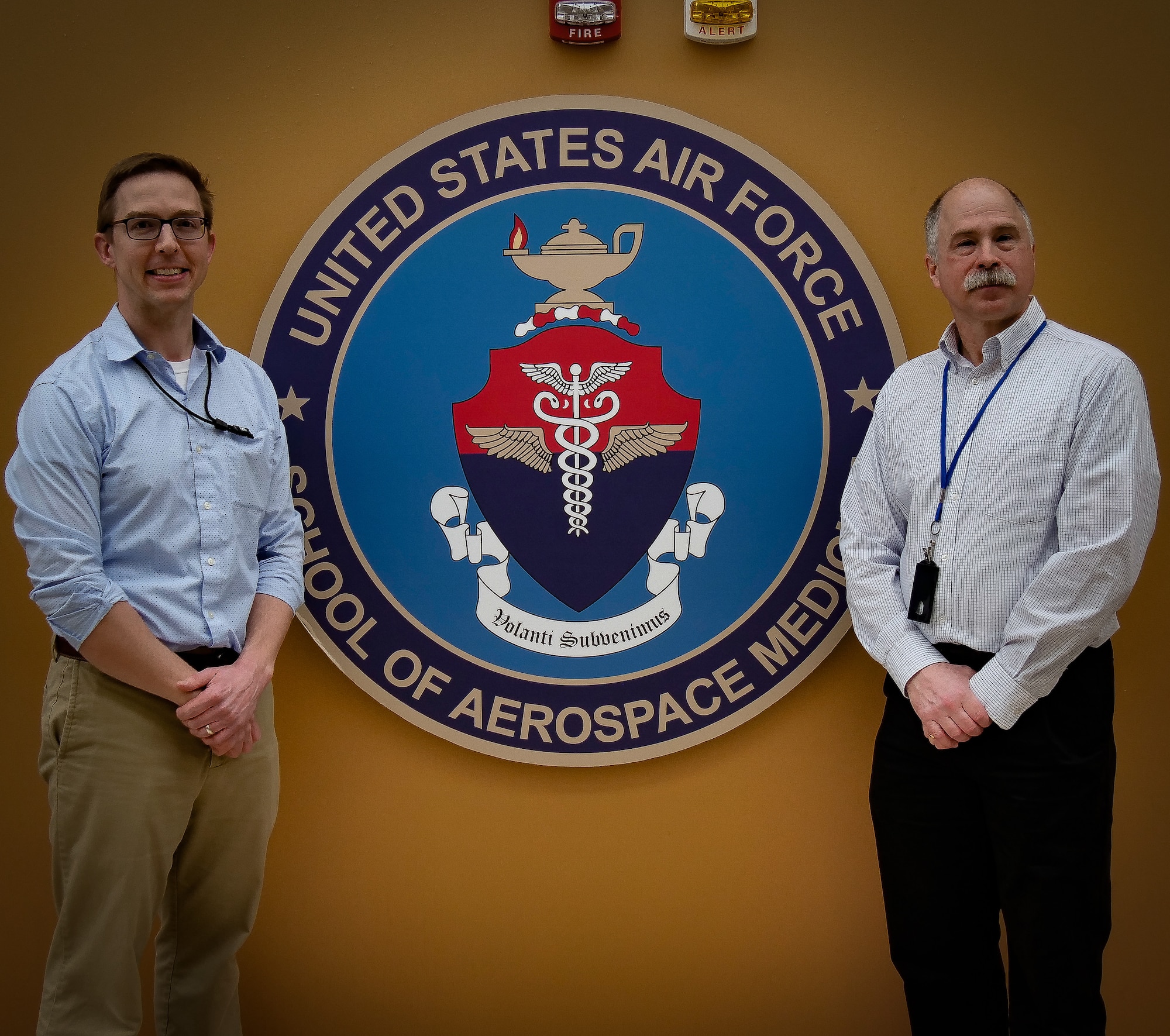 Dr. Anthony Fries, a bioinformatics scientist, (left), and Dr. Paul Sjoberg, a program manager with the Department of Defense Global Respiratory Pathogen Surveillance Program at USAFSAM’s Epi Lab, discuss how the lab and the Centers for Disease Control and Prevention monitor influenza to provide the U.S. Food and Drug Administration critical data for manufacturers of the flu vaccine in Episode 21 of AFRL’s “Lab Life” podcast, now available for download. (U.S. Air Force photo/Keith Lewis)