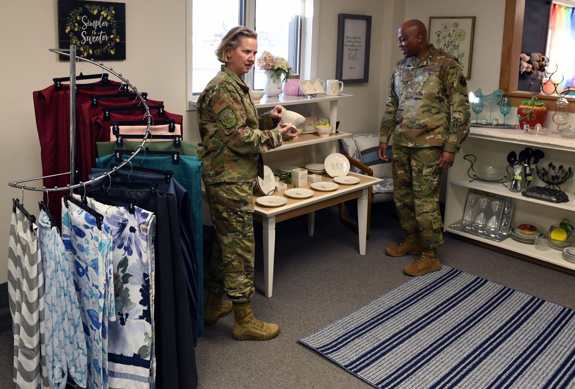Col. Jennifer Reeves, 341st Missile Wing commander, and Chief Master Sgt. Ron Harper, 341st MW command chief, tour the thrift store renovations Feb. 3, 2020 at Malmstrom Air Force Base, Mont.