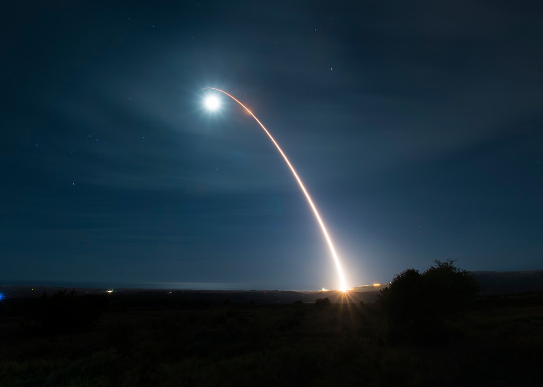 A missile launches into the sky.