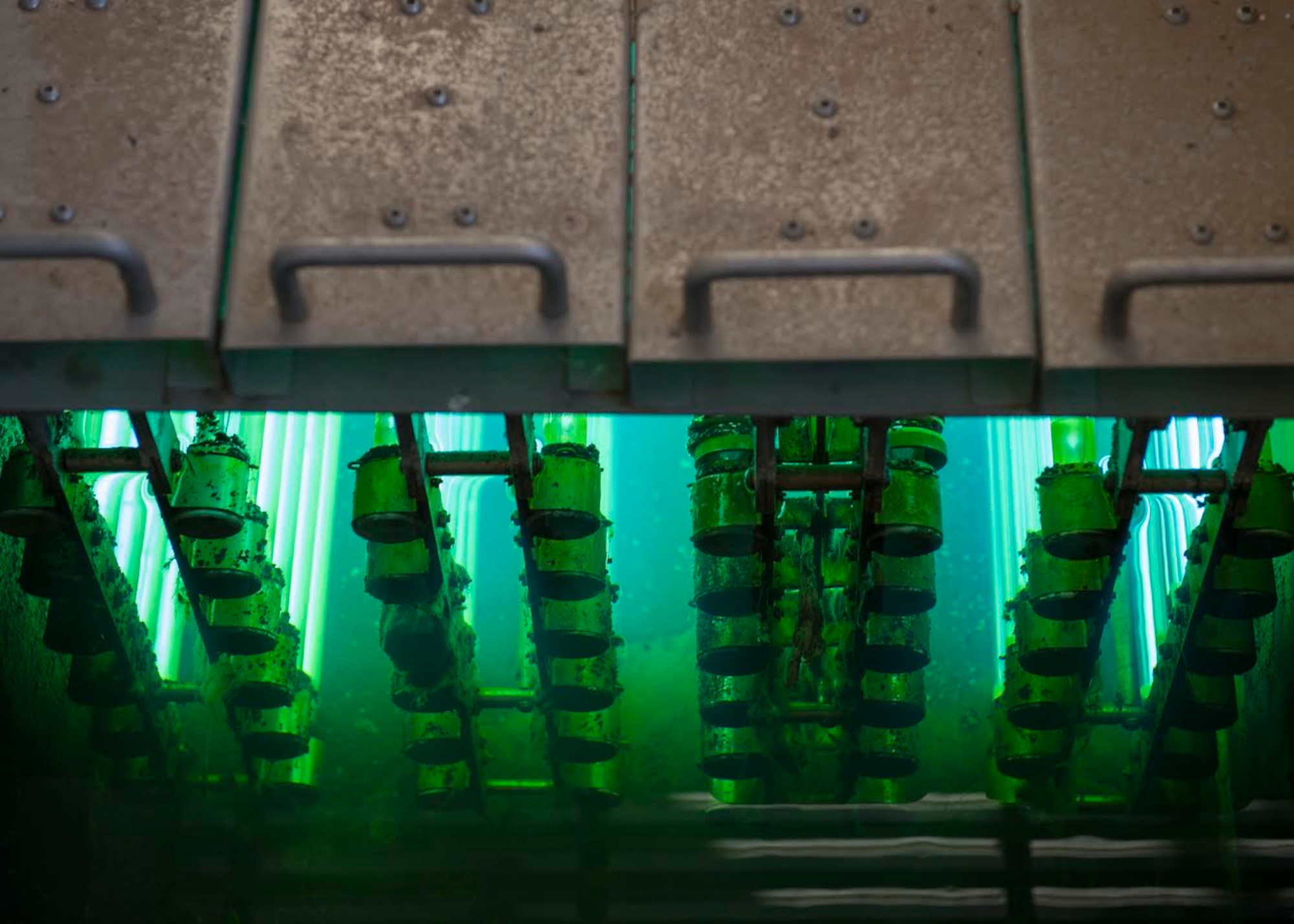 Ultraviolet lights sterilize E. coli and other bacteria in water Jan. 10, 2020, at the Luke Air Force Base Wastewater Plant in Ariz.