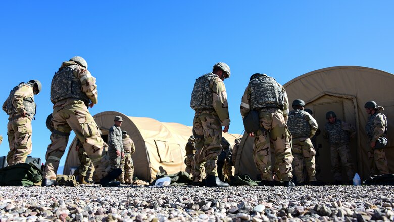 Airmen don MOPP gear